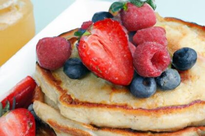 Fluffy Whole Wheat Pancakes Topped with Fresh Berries Delight
